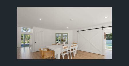 COMING SOON Beautifully Renovated 5-Bedroom Family Home in the Heart of Helensvale - Photo 4