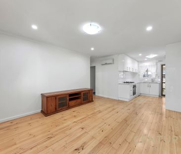 Bright and Modern | Ideal Location | Low Maintenance - Photo 5