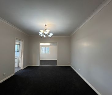 Three Bedroom Home with Sunroom - Photo 2