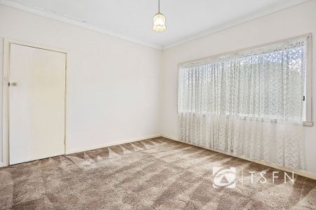 Charming Three-Bedroom Home with Shed and Side Access - Photo 5