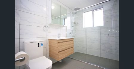 Modern 2 bedroom unit with garage - Photo 3