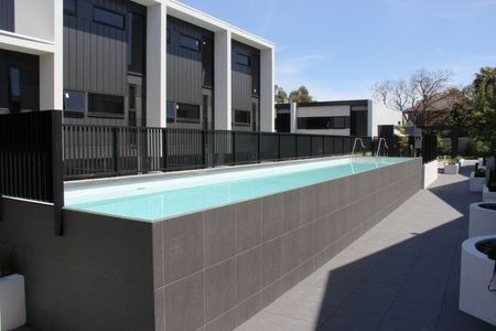 Modern Urban Living with Poolside Views! - Photo 2