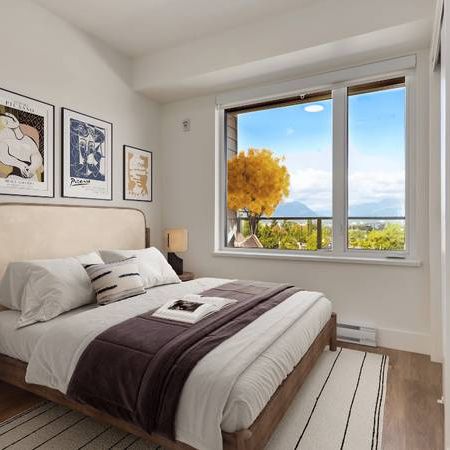 Open-concept kitchen, Quartz countertops, In-suite laundry - Photo 1