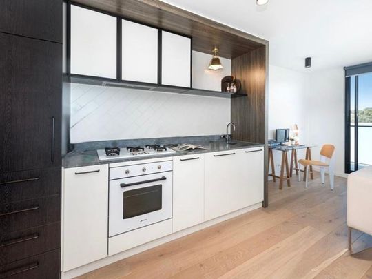 Riverside Living - Stylish Two-Bedroom Apartment in the Playhouse Development - Photo 1