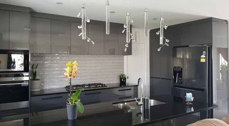 Modern Family Home with & Versatile Living Spaces - Photo 4