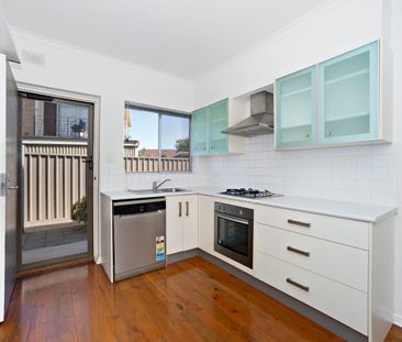 Tastefully Renovated Ground Floor Unit in Quiet Complex - Photo 4