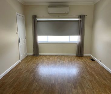 COMFORTABLE 3 BEDROOM HOME - Photo 1