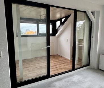 Geschmackvolle 2-Zimmer-DG-Wohnung mit Wintergarten & Galerie - Photo 3