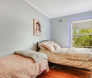 Bright and Spacious, Well-Maintained Home on a Corner Allotment! - Photo 1