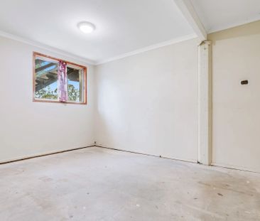 Perfect Family Living: Light-Filled Home with Fenced Yard - Photo 1