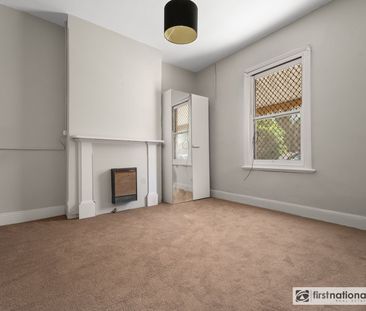 Freshly Updated & Centrally Located – Comfort Meets Convenience - Photo 2