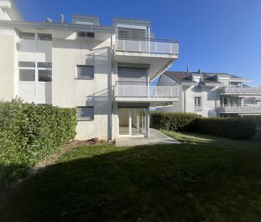 Bel appartement de 3 pièces au rez-de-chaussée avec terrasse et jardin - Photo 1