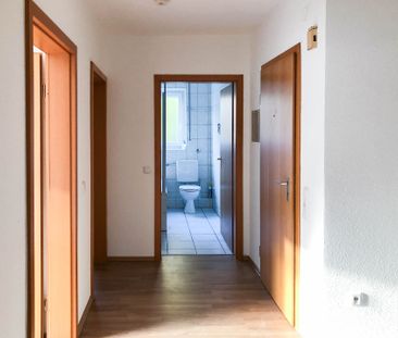 Gut geschnittene EG Wohnung mit Balkon und Garage - Foto 1