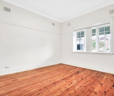 Two Bedroom Duplex Masterpiece Offering Convenience - Photo 3