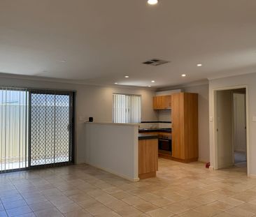 Charming, Secure 4-Bedroom, 2-Bathroom Home, Featuring Triple Garag... - Photo 5