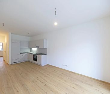 Zentrumsnahe 2 Zimmer Wohnung mit Einbauküche und Balkon - Foto 4