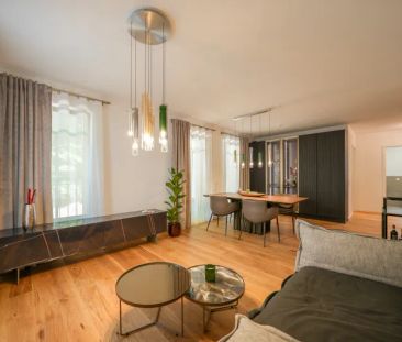 Traumhafte Neubauwohnung im Souterrain mit großem eigenen Garten - Photo 2