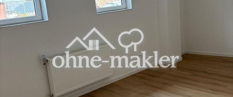 Moderne Erdgeschosswohnung mit 52 m² – Erstbezug nach Sanierung in zentraler Lage - Photo 1