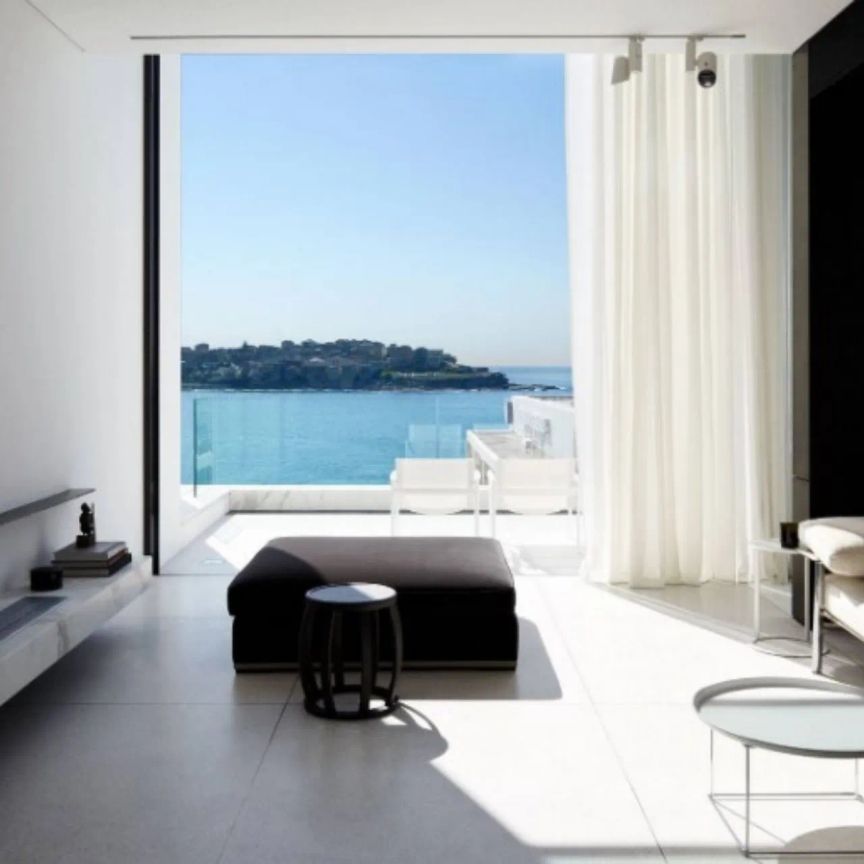 Architecturally Stunning home with direct water views from every level! - Photo 1