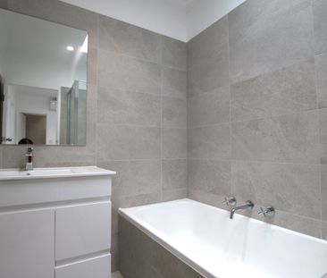 Newly Renovated 3-Bedroom Unit - Photo 6