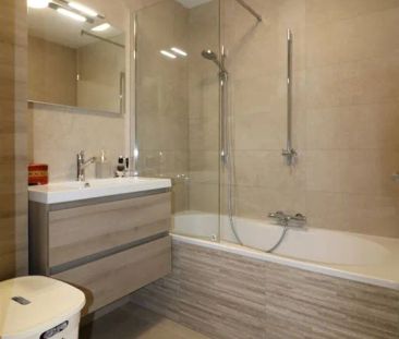 Gelijkvloers appartement met zuidgericht terras en tuintje, autosta... - Photo 1