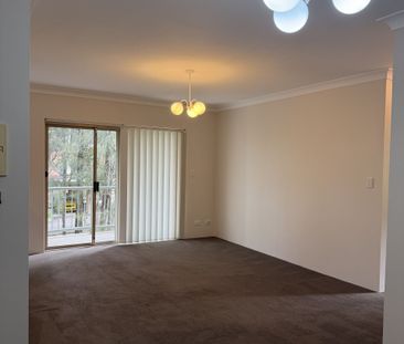 Neat 2 bedroom unit in security block available NOW - Photo 1