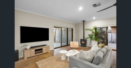 Modern Coastal Luxury Meets Family Comfort - Photo 4