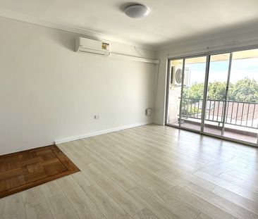 FULLY RENOVATED FLOOR 2 BEDROOM UNIT 500M TO AUBURN STATION - Photo 6