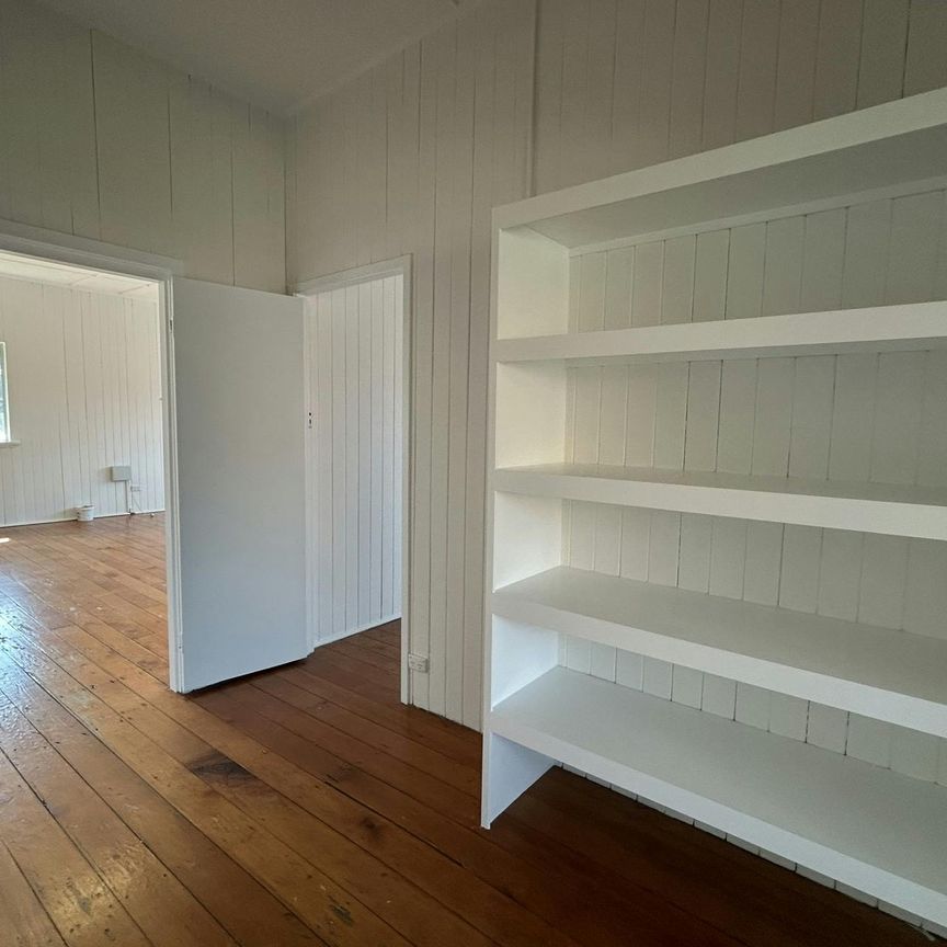SPACIOUS QUEENSLANDER WITH EXTRA MULTI PURPOSE ROOM AVAILABLE NOW! - Photo 1