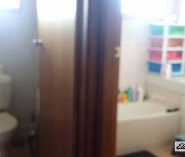 Charming 3 Bedroom Brick Home with Double Garage - Photo 4