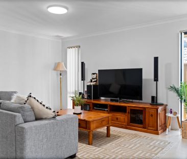 Immaculate 4x2 Family Home with Multiple Living Areas - Photo 2