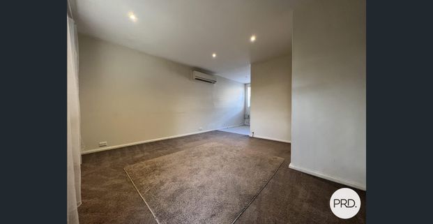 Neat & Convenient 2-Bedroom Unit in a Prime Location - Photo 1
