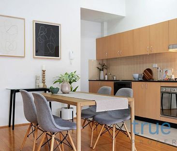 STYLISH APARTMENT IN IDEAL LOCATION - Photo 1