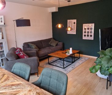 Lichtdurchflutete 2-Zimmer-Souterrain-Wohnung mit Terrasse und Garten - Photo 4