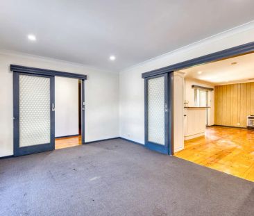 “Comfortable family home with flexible living zones” - Photo 1