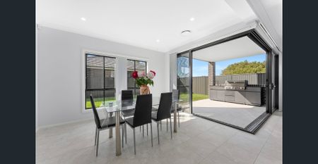AS NEW FAMILY HOME IDEAL FOR INDOOR/OUTDOOR ENTERTAINING!!! - Photo 2