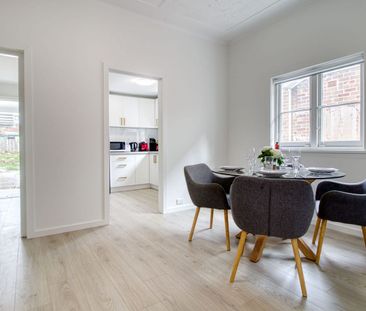Fully Renovated Three Bedroom For Rent - Photo 2