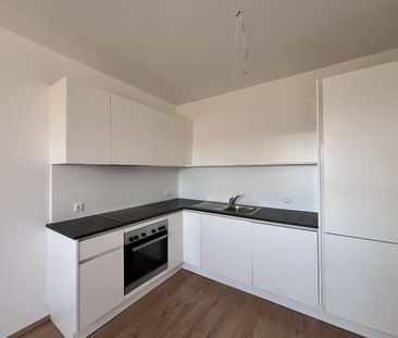 Perfekt aufgeteilte 2-Zimmer-Wohnung mit Einbauküche - Photo 4