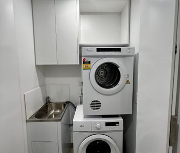 Stylish Fully Furnished 2-Bedroom Apartment with Parking in Wolli C... - Photo 2