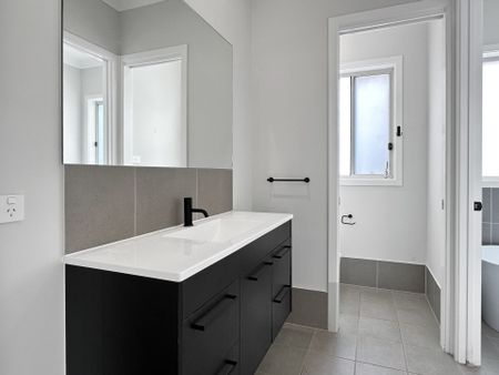 Premium Four-Bedroom Family Home in a Convenient Location - Photo 2