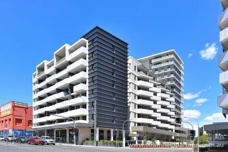 Stylish 2-Bedroom Apartment with Resort-Style Living - Photo 2