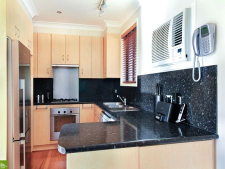 3 Bedroom Home with the Garage You've Been Looking For! - Photo 4