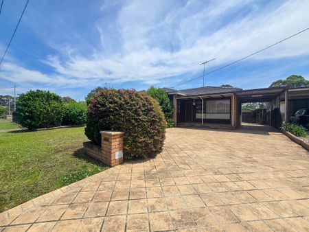 Lovely Retro-Style Family Home with a Big Backyard and Plenty of Character. - Photo 2