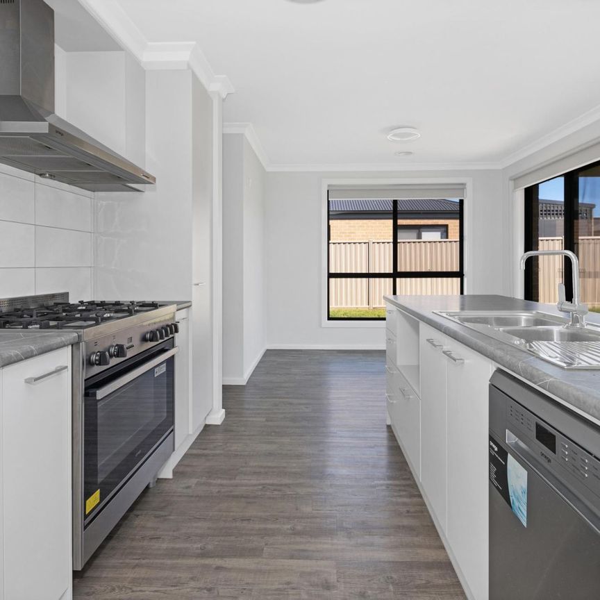 BEAUTIFULLY KEPT HOME IN GROWING AREA - Photo 1