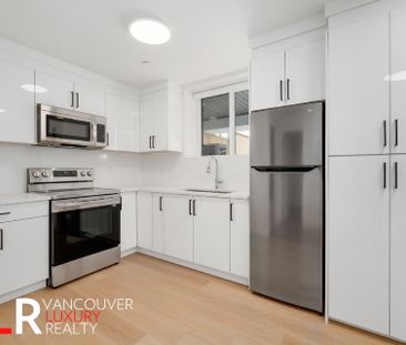 Duplex in Vancouver East Side, BC - Photo 1