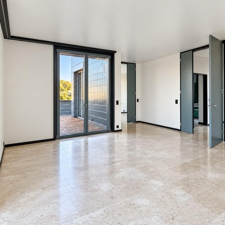 4,5 Zimmer-Neubauwohnung mit grosser Terrasse in Richtung Flughafen! - Foto 1