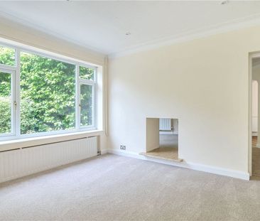 A four bedroom detached family home with a detached garage and driv... - Photo 3