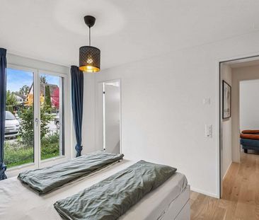 Moderne und lichtdurchflutete 4.5-Zimmer-Wohnung mit Gartenfläche - Photo 4