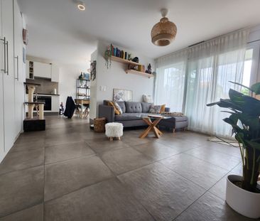 Appartement de 2,5 pièces au rez-de-chaussée avec jardin - Photo 1