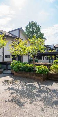 Sunlit Cambie Courtyard Townhome with Spacious Patio 460 W 16th - Photo 1